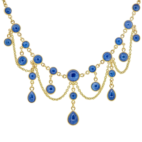18 - SAPPHIRE DROP NECKLACE, set with 11 cabochon cut blue sapphires, suspending 9 sapphire set drops lin... 