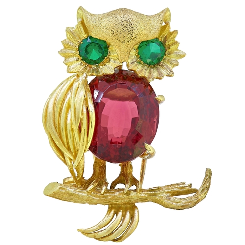 27 - TOURMALINE AND PERIDOT OWL BROOCH, designed as an owl sitting on a branch. The body set with a large... 