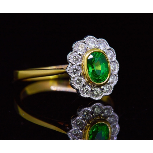 29 - GREEN GARNET AND DIAMOND CLUSTER RING, set with a central green garnet, surrounded by diamonds. Size... 