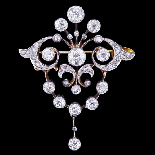 38 - ANTIQUE BELLE-EPOQUE DIAMOND DROP BROOCH, of openwork part scrolling dsign, set with diamonds and su... 
