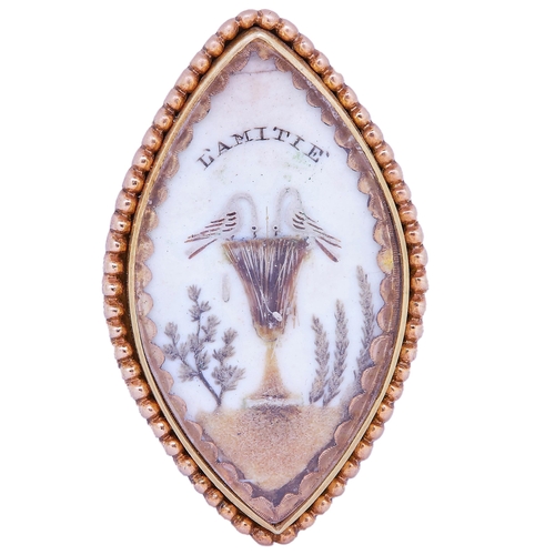 47 - MEMORI OBJECT, of marquise shape. decorated with 2 swans drinking from a vase, on a landschape backg... 