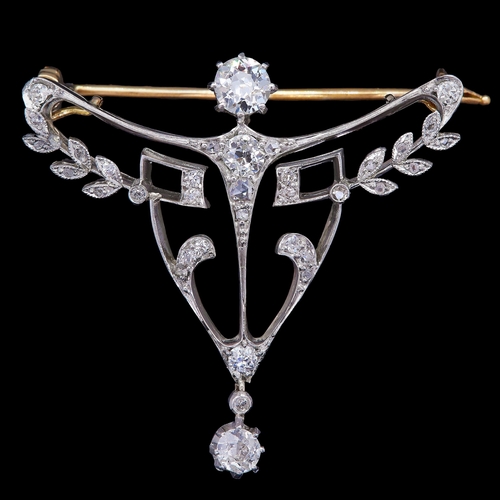 14 - BELLE EPOQUE DIAMOND BROOCH, of part openwork design. Set with diamonds totalling approx. 1.25 ct. W... 