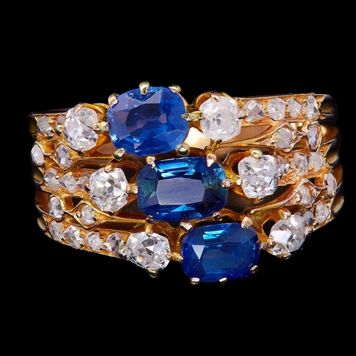19 - 3-BAND SAPPHIRE AND DIAMOND DRESS RING, each band set with a central blue sapphire, totalling approx... 