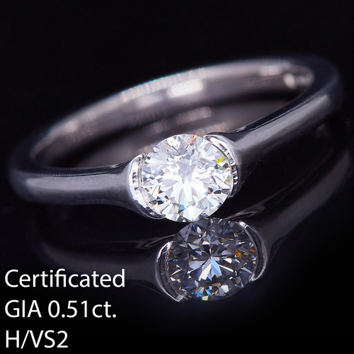 2 - DIAMOND SOLITAIRE RING, in platinum. Set with a round brilliant cut diamond of 0.51 ct. Size M. 4.6 ... 