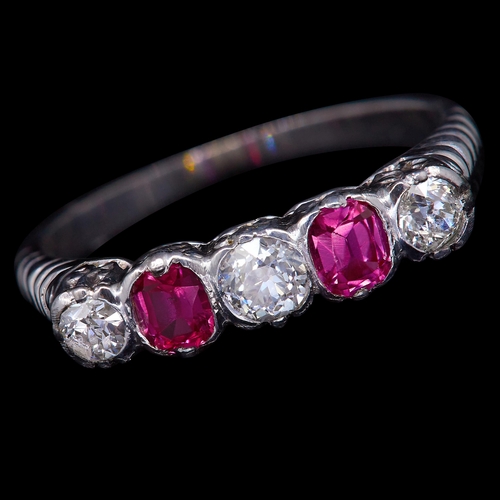 20 - 5-STONE RUBY AND DIAMOND DRESS RING, Set with 2 rubies, totalling approx. 0.42 ct. Flanked with 3 di... 
