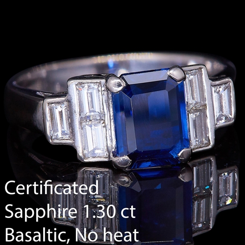 28 - CERTIFICATED SAPPHIRE AND DIAMOND DRESS RING, in 18 ct. white gold. Set with a central octagonal cut... 