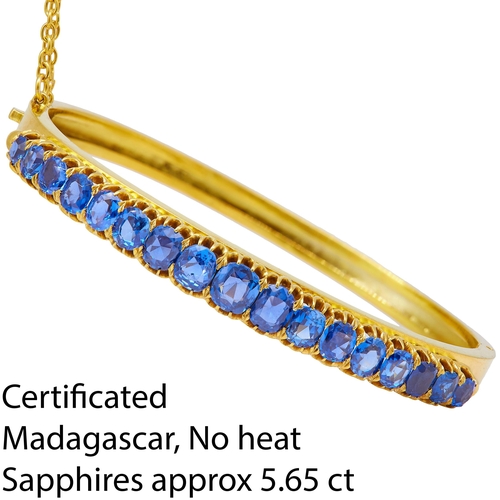31 - CERTIFICTED SAPPHIRE HINGED BANGLE, set with graduated blue sapphires totalling approx. 5.65 ct. Inn... 
