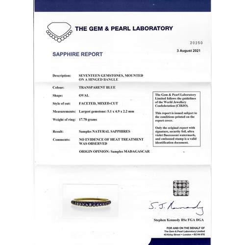 31 - CERTIFICTED SAPPHIRE HINGED BANGLE, set with graduated blue sapphires totalling approx. 5.65 ct. Inn... 