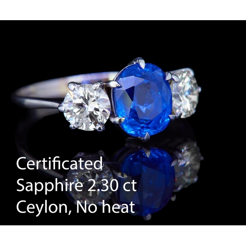 54 - CERTIFICATED SAPPHIRE AND DIAMOND 3-STONE RING, set with a central blue sapphire of approx. 2.30 ct.... 