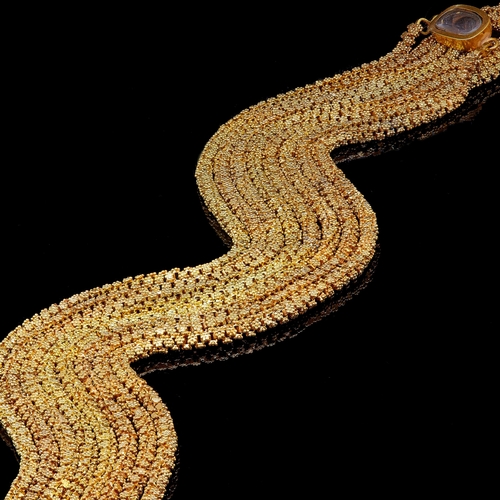 6 - ANTIQUE TRICHINOPOLY LONGCHAIN NECKLACE, the links all decorated with granulation bead clusters. The... 