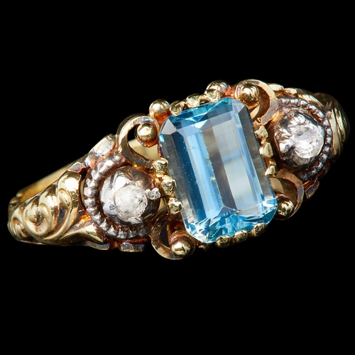 3 - AQUAMARINE AND DIAMOND DRESS RING, set with a central aquamarine of approx. 0.88 ct. Flanked with a ... 