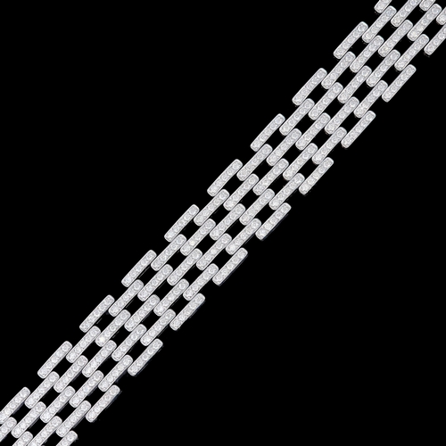 44 - A SPECTACULAR PAVÉ SET DIAMOND BRACELET, of articulated pavé set dimaond brick link design, Diamonds... 