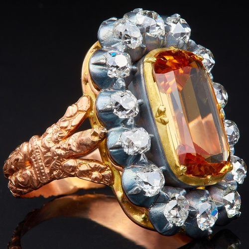 70 - IMPORTANT CERTIFICATED IMPERIAL TOPAZ AND DIAMOND CLUSTER RING, Set to the centre with a cushino cut... 