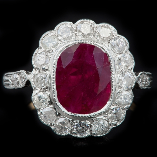 20 - RUBY AND DIAMOND CLUSTER RING, set with a central ruby of approx. 2.37 ct. surrounded with diamonds ... 