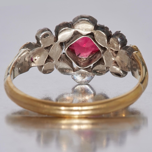 103 - GEORGIAN RUBY AND DIAMOND RING, set with a central ruby, flanked by diamonds and a ruby on each shou... 