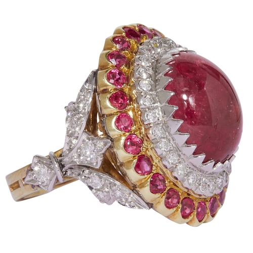 167 - LARGE RUBY AND DIAMOND CLUSTER RING, set to the center with a large oval cabochon cut ruby of approx... 