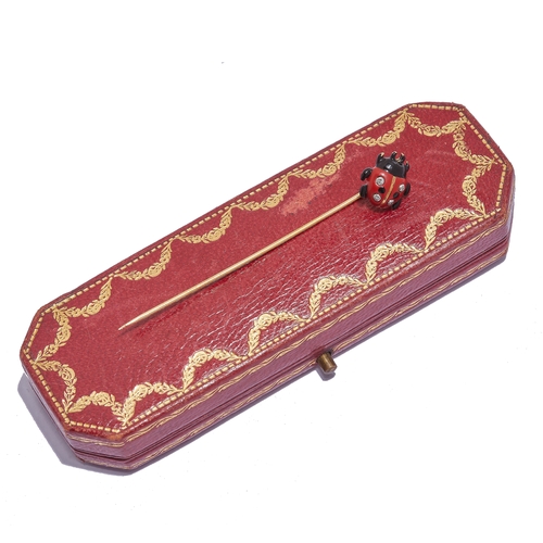 63 - CARTIER, DIAMOND AND ENAMEL LADYBUG STICK PINK, The ladybug decorated with black and red enamel acce... 