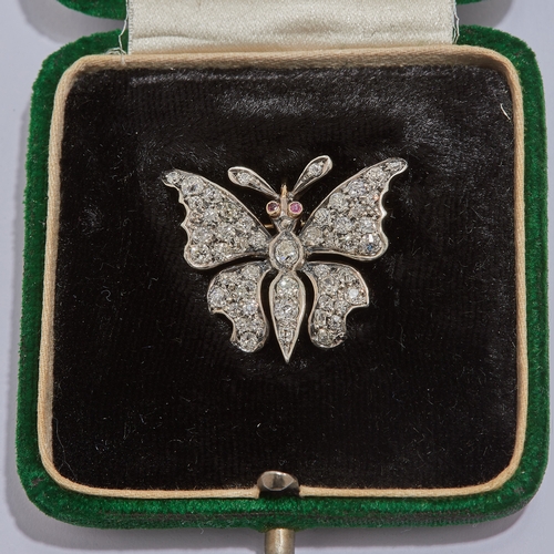 142 - VICTORIAN DIAMOND BUTTERFLY BROOCH, set with old cut diamonds totalling approx. 1.50 ct. and 2 ruby ... 