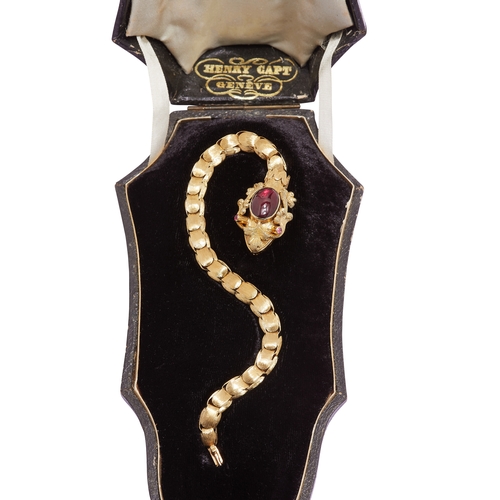 2 - ANTIQUE VICTORIAN GARNET SNAKE BRACELET, the bracelet designed as a snake. The head with with a cabo... 