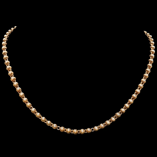 61 - SEED PEARL NECKLACE, the links each set with a seed pearl. L. 38 cm. 11.9 grams.