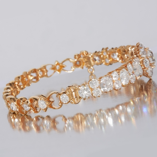 94 - IMPORTANT DIAMOND HINGED BANGLE, set to the top with an old ut diamond cluster, flanked with alterna... 