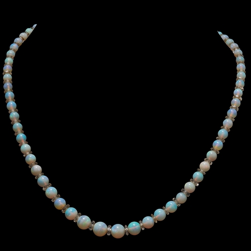 153 - OPAL BEAD NECKLACE, the single row necklace with opal beads, graduating in size. Alternated with a r... 