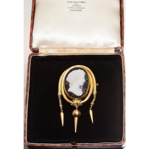 223 - VICTORIAN HARDSTONE CAMEO TASSEL BROOCH, Set with a large hardstone carved cameo depicting the bust ... 