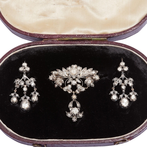 244 - ANTIQUE DIAMOND DROP BROOCH AND PAIR OF DIAMOND CHANDELIER DROP EARRINGS. The brooch of openwork flo... 