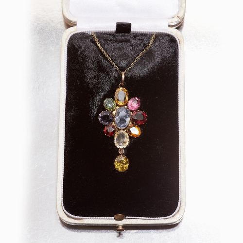 265 - MULTI GEMSTONE DROP PENDANT, The pendant set with multi gemstones including a blue sapphire to the c... 