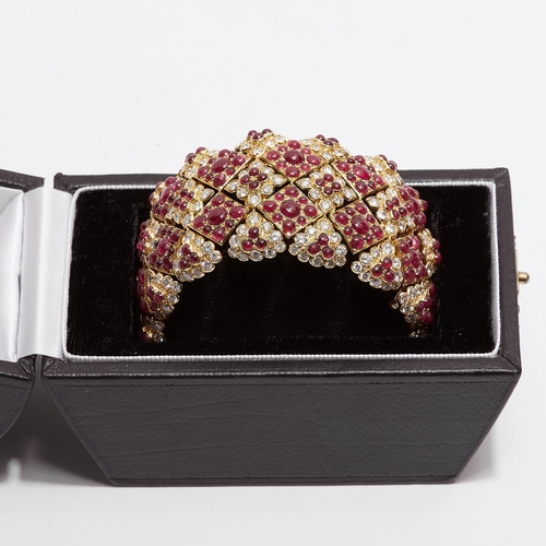 311 - IMPORTANT RUBY AND DIAMOND WIDE BRACELET, in 18 ct. gold. The lozenge-shaped links set with cabochon... 