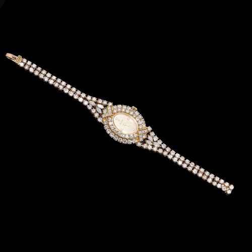 388 - FARSI, DIAMOND WRIST WATCH, in 18 ct. gold. The bezel and strap fully set with round, baguette and p... 