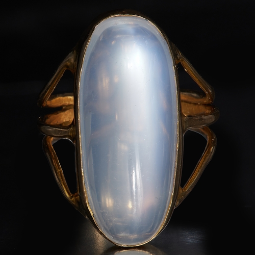 53 - LARGE MOONSTONE SOLITAIRE RING, set with an elongated cabochon cut moonstone with nice blue shiller.... 