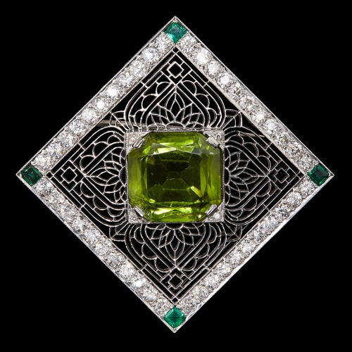 19 - PERIDOT, DIAMOND AND EMERALD BROOCH, of opework square design. Set to the center with a peridot f ap... 