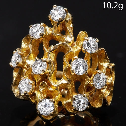 24 - RETRO DIAMOND RING,in 18 ct. gold. The ring of openwork free form design, accentuated with diamonds ... 