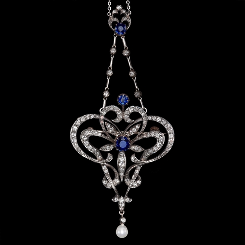 3 - BELLE EPOQUE SAPPHIRE, PEARL AND DIAMOND PENDANT BROOCH. set with blue sapphires totalling approx 1.... 