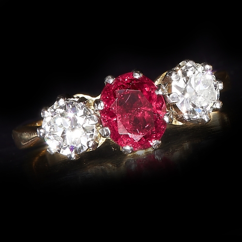 165 - RUBY AND DIAMOND 3-STONE RING, in 18 ct. gold. Vibrant ruby of approx. 1.07 ct. bright and lively di... 