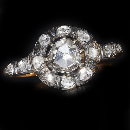 17 - FINE GEROGIAN DIAMOND CLUSTER RING set with a large bright lively rose cut diamond in the centre . w... 