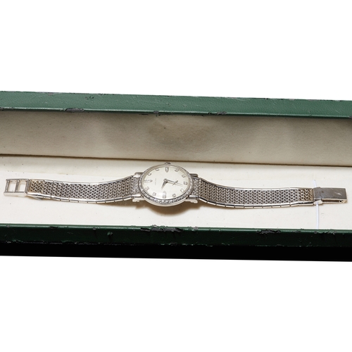 174 - HAMILTON, DIAMOND SET WRISTWATCH, in 14 ct. gold. The bezel and indices on the dial set with idamond... 