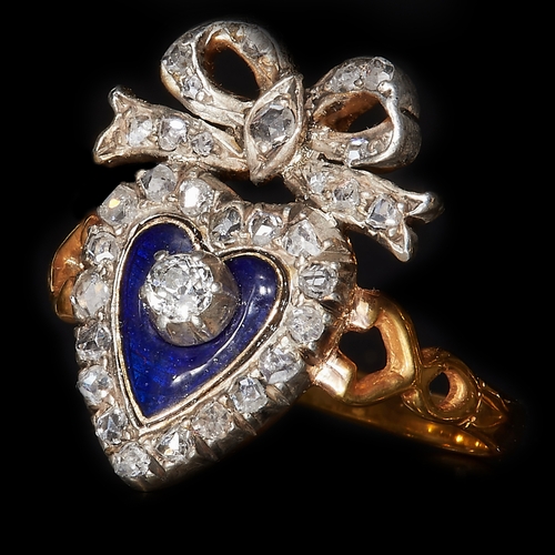 177 - ANTIQUE DIAMOND SET HEART BOW RING WITH ENAMEL. set with bright lively diamonds. on a blue enamel ba... 