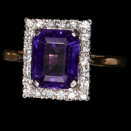 21 - AMETHYST AND DIAMOND CLUSTER RING. stamped 18 ct and plat. set with a  rich vibrant amethyst, surrou... 