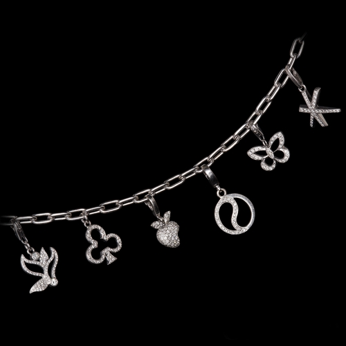 44 - CARTIER SPARTACUS DIAMOND CHARM BRACELET. set with diamonds totalling approx. 2.20 ct. consisting of... 