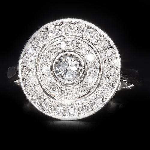 46 - DIAMOND CLUSTER RING. stamped 18 ct.  set with bright lively diamonds. 4.3 grams. size K.