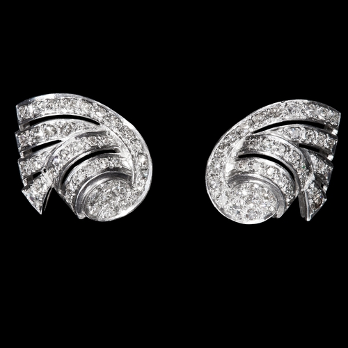 55 - PAIR OF DIAMOND CLIP EARRINGS. set with bright lively diamonds totalling approx 1.10 ct. 2 cm diamet... 