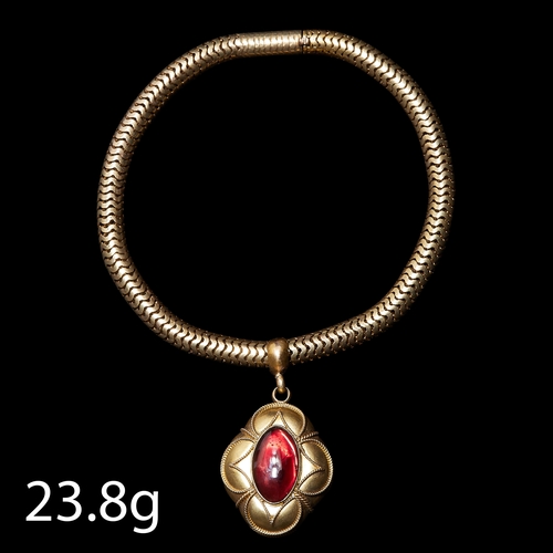 58 - VICTORIAN GOLD BRACELET WITH GARNET LOCKET DROP. snake link bracelet . set with a large vibrant cabo... 