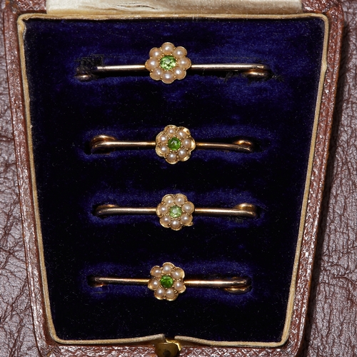 11 - ATTRACTIVE EDWARDIAN SET OF 4 PERIDOT AND PEARL BROOCHES. L. 2.5 - 3.1 cm. 4.7 grams. With original ... 