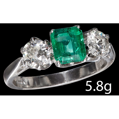 199 - FINE EMERALD AND DIAMOND THREE STONE RING.
Platinum. 
Rich and vibrant emerald of approx 1.01 ct. 
D... 