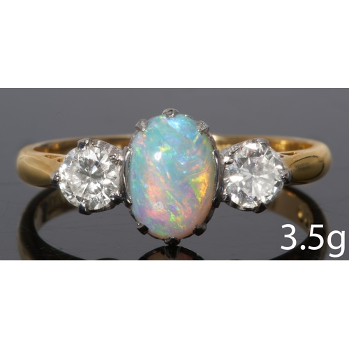 8 - OPAL AND DIAMOND THREE STONE RING
18 ct. gold.
Set with an opal of great play of colour.
Bright and ... 