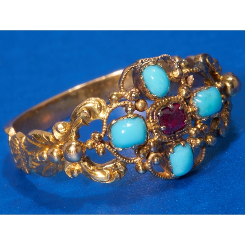 136 - ANTIQUE RUBY AND TURQUOISE RING,
High carat gold.
Vibrant ruby.
Turquoise well matched.
Size O.
3 gr... 