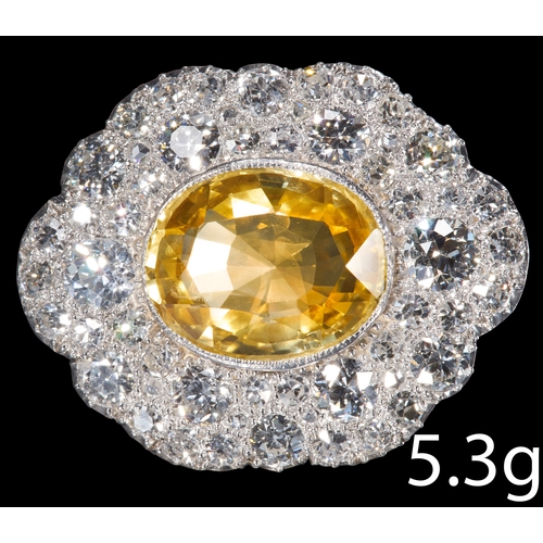 163 - FINE YELLOW SAPPHIRE AND DIAMOND BROOCH,
Rich and vibrant yellow sapphire of approx. 6.90 ct.
Diamon... 