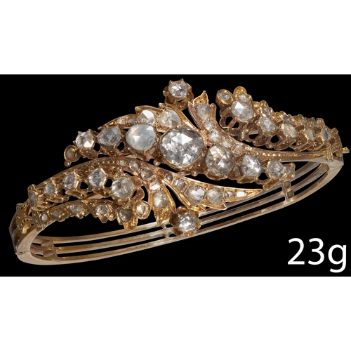 176 - ANTIQUE DIAMOND TWIST BANGLE,
High carat gold.
Part twist design.
Rose cut diamonds.
Inner diam. 5.8... 